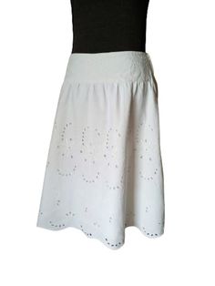 This is a vintage A-line white summer skirt, made of 100 % linen, with cut out embroidery and embroidered waistband. Casual, yet elegant skirt, comfortable and beathy, closes with a zipper on the left side, fully lined with 100% cotton fabric. The lable with the size is missing, so please check the exact dimensions below, taken flat. waist - 39 cm/ 15.4 in hansh - 48 cm/ 18.9 in length - 67 cm/ 26.4 in This skirt would suit a size - M/L Condition: very well preserved, no stains, no tears Shippin White Summer Skirt, White Skirt Summer, White Linen Skirt, Skirt Linen, Embroidery Skirt, Cutwork Embroidery, Striped Turtleneck, Elegant Skirt, Skirt White