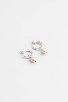 Wolf Circus silver freshwater dainty small Pearl Hoops | Pipe and Row Seattle Small Silver Earring Hoops, Cheap Small Hoop Pearl Earrings For Everyday, Gold Filled Hoops, Pearl Hoop Earrings, Demi Fine Jewelry, Vancouver Canada, Sterling Silver Hoops, Recycled Sterling Silver, Pearl Size