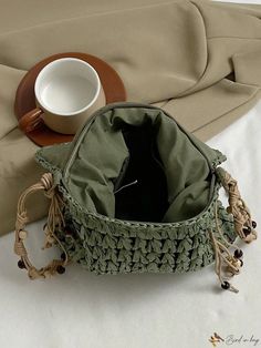 Bird in Bag - Seaside Chic Woven Bag - Bohemian Vibes for Women Trendy Green Hobo Bag For Beach, Trendy Green Hobo Bag For Vacation, Casual Green Pouch-shaped Bucket Bag, Casual Green Pouch Bucket Bag, Casual Green Bucket Bag, Green Handheld Woven Bag, Green Pouch Bag For Vacation, Casual Green Hobo Pouch Bag, Casual Green Bags With Braided Handles