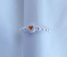 Check out my Etsy Page or DM me!!

#valentines #giftsforher #giftsforhim #giftsforfriends #beadedring #beadedjewelry #handmade #handmadejewelry #pearljewelry #pearl #heart #heartbracelet #etsy #etsyshop #etsyseller #smallbusiness #supportsmallbusiness #custommadejewelry #jewelry #jewellrybybecks #rings Dainty Handmade Adjustable Heart Ring, Adjustable White Heart-shaped Jewelry, White Heart Beads Jewelry For Gift, Trendy White Adjustable Rings, Trendy Adjustable White Rings, Trendy White Wedding Ring, White Heart Ring For Gift, White Round Jewelry For Friendship, Personalized White Heart Ring For Valentine's Day