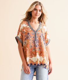 Women's Paisley Notch Neck Top In Orange By Daytrip., Women's Navymulti Printed woven top Cuffed sleeves Bust measures 44 on size small Body length 24 3/4 on size small. 100% Rayon. Machine wash cold with like colors gentle cycle. Only non-chlorine bleach when needed. Line dry. Warm iron if needed.. Measurements: Bust -Fullest part of bust with arms at sides. Waist -Circumference of natural waist: above belly button below rib cage. Hips -Standing with feet together fullest part of hips. WOMEN'S Notch Neck Top, Waist Circumference, Top For Women, Woven Top, Women Shirts Blouse, Rib Cage, Shirts Blouses, Women's Shirts, Cuff Sleeves