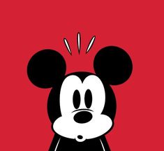 the mickey mouse face has been drawn in black and white on a red background,