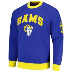 The Tommy Hilfiger Royal Los Angeles Rams Reese Raglan Tri-Blend Pullover Sweatshirt is the perfect way to show your support for the Los Angeles Rams. Made from a comfortable cotton, polyester, and spandex blend, this midweight sweatshirt features raglan sleeves and an embroidered fabric applique that proudly displays the Rams logo. Whether you're cheering from the stands or relaxing at home, this sweatshirt will keep you warm and stylish. Embroidered fabric applique Raglan sleeves Crew neck Mid Rams Logo, Fabric Applique, Los Angeles Rams, Embroidered Fabric, Tommy Hilfiger Man, Barnes And Noble, Long Sleeve Pullover, Girls Shopping, Raglan Sleeve