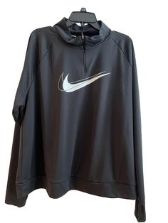 This NWT Nike women's plus size 2XL pullover is perfect for runners who want to stay comfortable and stylish while they exercise. The high-neckline and long sleeves make it suitable for cooler weather and the 1/4 zip closure allows for easy ventilation. The solid black color and Nike Dri-Fit technology make it a great addition to any activewear wardrobe. Made of 100% polyester, this pullover is both durable and breathable, ensuring you stay dry during your workout. The activewear top also featur Affordable Nike Moisture-wicking Tops, Nike Pullover, Black Pullover, Cooler Weather, Active Wear Tops, High Neckline, 1/4 Zip, Active Wear For Women, Nike Dri Fit