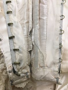 "Museum Deaccession: Beautiful and rare ladies Historical Wedding Ensemble dated to the early 1890s in great condition. As you can see from the photos, it presents quite well. Hand made in New York by A F Jammes with fine couture detailing for a Miss EB Jennings. (hand written on a sewn in piece of silk) Both pieces are 100% Silk Duchess Satin in a Golden Champagne color Fitted Bodice: Falls to natural waist at sides but dips down in the front and back High neck bodice trimmed down the front wit Regency Style Wedding Corset With Historical Design, Regency Style Historical Wedding Corset, Victorian Corset With Historical Design For Wedding, Victorian Wedding Corset With Historical Design, Regency Style Wedding Corset With Boned Bodice, White Victorian Wedding Corset, White Historical Design Corset For Wedding, Historical Design White Wedding Corset, Victorian Corset With Historical Design For Formal Occasions