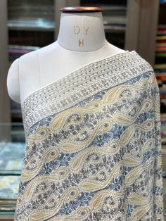 Kashmir is known for its craftsmanship. From carpets to shawls and scarves every single product made in Kashmir is made by diligent craftsmen who work round the clock to make a very fine quality product. This shawl is made of 100% Pure Cashmere Wool and its embroidered fully with neutral colour to give it a classical look. Its embroidered by traditional Kashmiri style of Aari embroidery The embroidery done on this is a traditional Kashmiri Embroidery known as ''Aari Work''. It has a combination Kashmiri Embroidery, Shawl Wedding, Kashmiri Shawls, Abstract Embroidery, Cashmere Pashmina, Aari Embroidery, Cashmere Wrap, Cashmere Shawl, Wedding Shawl