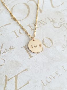 "Couples Initial Necklace - 14K Gold Filled - Mothers Gift - Name Necklace - Initial Necklace - Personalized Necklace - Gift for Her - 11mm * Dimensions: 11mm Diameter 14K Gold Filled Circle Disc Pendant * Necklace Chain Length: Available in 14in, 16in, or 18in ---------------------------------- HOW TO ORDER 1. Select the length that you would like from the drop down menu. * This item only comes in Font Type 3 (1.5mm)* This listing is for (1) necklace. Please feel free to let us know if you have 14k Gold Stamped Round Disc Jewelry, 14k Gold Necklace For Valentine's Day, Dainty Hand Stamped Necklaces For Anniversary, Mother's Day 14k Stamped Charm Necklace For Anniversary, 14k Gold Hand-stamped Charm Necklace For Anniversary, Dainty Stamped Charm Necklaces For Anniversary, Dainty Stamped Charm Necklace For Anniversary, 14k Gold Stamped Jewelry As Gift, Anniversary 14k Gold Hand Stamped Charm Necklace