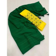 Green colored saree is made from georgette fabric which is highlighted with beautiful zari weaving work as shown. comes along with unstitched embroidered georgette blouse which you can customise as per your design/style. Occasion - You can wear this saree for festive and functions, outing and get-together. Note:- the actual product may differ slightly in color and design from the one illustrated in the images when compared with computer or mobile screen. Measurements: Saree : Georgette : 5.5 Mtr Green Art Silk Pre-draped Saree With Embroidered Border, Designer Green Pre-draped Saree With Embroidered Border, Green Georgette Saree With Embroidered Border, Unstitched Georgette Blouse Piece With Embroidered Border, Green Unstitched Zari Weaving Sharara, Green Unstitched Sharara With Zari Weaving, Green Georgette Saree With Traditional Drape, Green Georgette Saree In Traditional Drape, Green Traditional Embroidered Georgette Fabric