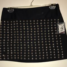 Britney Spears For Candies Mid 2000’s Backstage Pass Black Studded Mini Skirt Size Small. 100% Cotton And Lining Is 100% Polyester. This Is Brand New With Tags. It Has Some Clip Marks From Being On A Hanger In My Closet.Would Probably Come Out With Washing Or Ironing. It Comes With Replacement Metal Studs. About 14 By 16 1/2 Pleated Flare Skirt, Short Black Skirt, Ruffled Mini Skirt, Grey Mini Skirt, Peplum Skirt, Purple Skirt, Black And White Skirt, Black Mini Skirt, Printed Denim