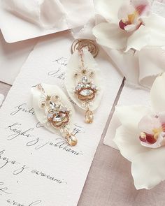 Orchid Bridal Earrings Crystal Gold Ivory and Blush Wedding - Etsy Poland Handmade Rose Gold Bridal Earrings For Wedding, White Crystal Embellished Bridal Earrings For Wedding, Gold Crystal Chandelier Earrings For Wedding, Gold Chandelier Earrings With Crystals For Wedding, White Crystal Embellished Wedding Earrings, Elegant Handmade Crystal Wedding Earrings, Elegant Handmade Crystal Earrings For Wedding, Delicate Handmade Chandelier Earrings For Wedding, Handmade White Crystal Earrings For Wedding