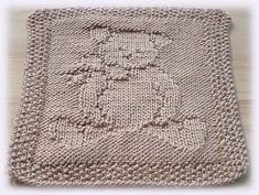 a knitted square with a cat on it