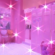 a room with pink walls and lots of stars on the ceiling, in front of two lockers