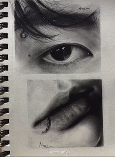 an open spiral notebook with drawings of eyes