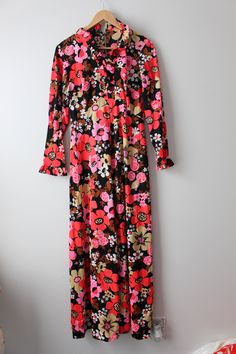 "42\"bust 28-30\"waist 59\"long small to medium womens vintage 1960s-70s dreamy print dress good condition 1970s RARE easy care and wear retro print wear dressy or casual zippers in the back Thank YOU and please feel free to ask me any ?s:) Have a lovely day!! xoxo www.etsy.com/shop/retroandme" Retro Pink Floral Print Maxi Dress, Pink Retro Maxi Dress With Floral Print, Retro Fitted Pink Maxi Dress, Pink Fitted Retro Maxi Dress, 70s Inspired Long Sleeve Floral Print Dresses, Retro Multicolor Floral Print Maxi Dress, Retro Spring Maxi Dress With Vibrant Print, Multicolor Retro Maxi Dress With Floral Print, 1970s Pink Long Sleeve Dress