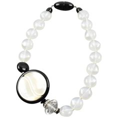 This elegant Angela Caputi, made in Italy resin choker beaded necklace, works with black and white contrast. The necklace features assorted beads and a side medallion. It is built with white opalescent round beads, a single black bead, and a large crystal clear faceted bead ornate with a clear rhinestones spacer ring. The pendant features a stylized Yin-Yang carved symbol with black resin framing and white pearlized resin. Her color matching is always extremely classy, perfect for casual and fan Antique Choker, Handmade Choker Necklace, Black And White Contrast, Quartz Choker, Yin Yang Necklace, Necklaces Choker, Extra Long Necklace, Lucite Jewelry, Black Choker Necklace