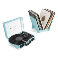 an old record player with vinyl records in it's case on a white background