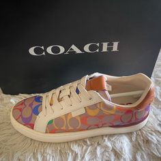 Signature Coated Canvas And Leather Upper Fabric Lining And Footbed Rubber Outsole Lace-Up Closure Fit: Runs Large, Order 1/2 Size Down I Have Size 5 And 8.5 Multicolor Flat Synthetic Sneakers, Trendy Purple Sneakers, Multicolor Sneakers With Cushioned Footbed And Flat Heel, Trendy Multicolor Flat Sneakers, Casual Pink Coach Sneakers, Coach Pink Low-top Sneakers, Trendy Coach Sneakers For Spring, Pink Low-top Coach Sneakers, Coach Sneakers