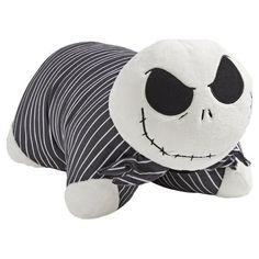 a stuffed animal that is wearing a striped shirt