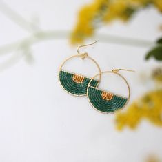 Hand beaded half circle emerald green and gold dangle earrings. Bright and unique semi round beaded earrings, modern and lightweight beautiful accent for cold winner or bright summer day. Mixed media earrings These circle (brass) earrings measure 3.8 cm They hang approx. 1 1/2 inch of the ear, from a stainless steel ear wire. Round Beaded Earrings, Green Beaded Earrings, Half Moon Earrings, Emerald Green Earrings, Pearls Diy, Artisan Earrings, Half Circle, Green Earrings, Moon Earrings