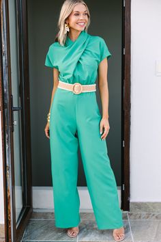 shop the mint, boutique clothing for women, trendy online boutique Green And Coral Outfit, Spring Wedding Attire, Green High-waist Stretch Jumpsuits And Rompers, Green V-neck Jumpsuit For Summer, Green Tropical V-neck Jumpsuits And Rompers, Turquoise Jumpsuit, Chic Green V-neck Jumpsuit, Green Fitted V-neck Jumpsuit, Trendy Romper