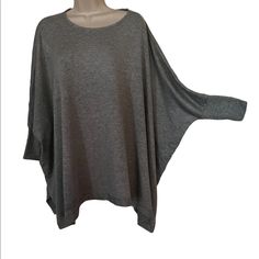 Alice + Olivia "Air" Gray Oversize Dolman Sleeve Top. Pure Comfort + Style. Soft Modal Spandex Blend With A Silk Insert In The Back. Ribbed 3/4 Cuffs. It's Marked A Small But I Think Can Be Worn By Anyone, Including During Pregnancy. Nwt $165 Versatile Batwing Sleeve Tops For Layering, Slouchy Drop Shoulder Tops For Layering, Casual Free Size Top With Batwing Sleeves, Casual Free Size Batwing Sleeve Tops, Slouchy Batwing Sleeve Tops For Layering, Slouchy Tops For Loungewear, Casual Slouchy Batwing Sleeve Tops, Slouchy Batwing Sleeve Tops For Fall, Oversized Gray Batwing Sleeve Top