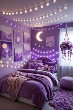 a bedroom decorated in purple and white with pictures on the wall, lights strung over the bed