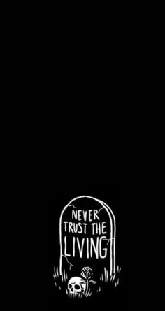 a black and white photo with the words never trust the living on it's side