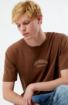 Elevate your streetwear with the Los Angeles Embroidered Vintage Wash T-Shirt from PacSun. Featuring a classic crew neckline and short sleeves, this tee offers a standard fit for effortless style. The front embroidery adds a touch of retro flair, while the vintage wash gives it a worn-in look and feel that's perfect for casual vibes.


	Crew neckline
	Short sleeves
	Standard fit
	Embroidery on the front
	Vintage wash
	Machine washable
	100% Cotton
	Model is wearing size medium
	Model Measurements: 6’3”  Height, 28” Waist, 33.5” Hips Exclusive Collection, The Vintage, Model Measurements, Pacsun, Crew Neckline, Effortless Style, Cool Style, Graphic Tees, Short Sleeves