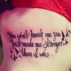 a woman with a tattoo on her stomach saying you won't break me, you just made me stronger than i was