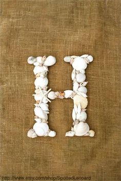 the letter h is made out of seashells