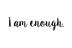 the word i am enough written in black ink