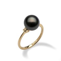 Delight in this classic Tahitian black pearl ring. The simple gold band features small hidden details just around the crown, highlighting the beautiful Tahitian black pearl. Locally made in Hawaiʻi by Maui Divers Jewelry. Black Pearl Jewelry, Tahitian Pearl Ring, Black Pearl Ring, Peacock Ring, Pearl Jewelry Design, Gold Color Ring, Tahitian Black Pearls, Gem Diamonds, Purple Pearl