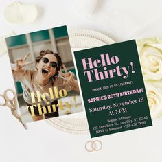 a hello thirty birthday party card on a plate with scissors and flowers in the background