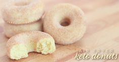 three donuts on a cutting board with the words apreper keto donuts