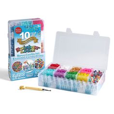 the box contains 10 different colored crayons and an assortment of beads in it