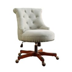 an upholstered office chair with casteors and wheels on the back is shown against a white background