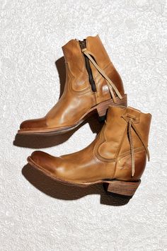 click to expand Western Calf Leather Boots With Stacked Heel, Western Style Calf Leather Boots With Stacked Heel, Fall Moto Boots With Oiled Leather, Fall Moto Boots In Oiled Leather, Oiled Leather Moto Boots With Leather Sole For Fall, Fall Western-themed Moto Boots With Stacked Heel, Rugged Fall Rodeo Heeled Boots, Western Chelsea Boots With Heel Pull Tab, Western Moto Boots With Stacked Heel