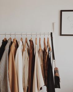 It's spring, and each new season makes us want a new wardrobe. To save you money, we're sharing how to refresh your wardrobe without purchasing a thing!  / closet organization Boutique Logo Design, Preloved Clothes, Boutique Logo, Hanging Clothes, Classic Wardrobe, Neutral Fashion, New Wardrobe, Closet Organization