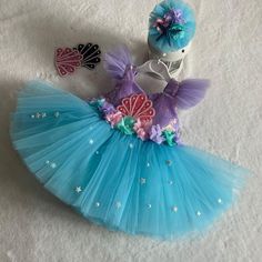 This eye-catching hair accessory is sent as a gift along with the dress💕. When ordering, please specify your baby's waist, chest and shoulder-knee measurements. ️Made from soft cotton lining. It has a zipper on the back, easy and convenient to use. 💕 ️Handmade dresses specially sewn for your baby. 👉🏻 You can leave a message for more questions. A very dense layer of tulle has been used, it is quite fluffy, 💕 Personalized color options are available, you can have it personalized.          ✈️ Mermaid Party Dress, Costume Mermaid, First Birthday Dress, Ariel Dress, First Birthday Dresses, Dress Mermaid, Dresses Mermaid, Mermaid Costume, Birthday Dress