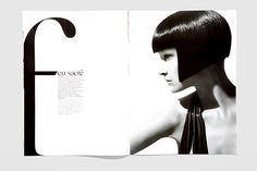 an image of a woman with short hair in black and white photo book spread out