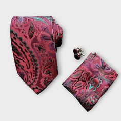 Treat yourself with a new pattern and splash of color to your look with this unique tie set. 100% Silk Handmade Package Includes: Tie, Pocket Square & Cufflinks. Length: 59" Width: 3.34" Warm iron if needed Multicolor Suit And Tie Accessories For Father's Day Gift, Red Tie For Father's Day Gift, Ruby Cufflinks Men, Luxury Classic Multicolor Ties, Unique Ties, Cufflink Set, Buy Wine, Tie Set, Green Silk