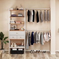 an organized closet with clothes hanging on shelves and shoes sitting on the floor next to it