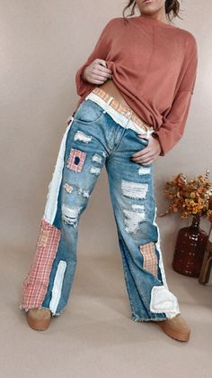 Hit the streets of style wearing these Oli & Hali: Preslee Patchwork Wide Leg Jeans! With distressed detailing and patchwork details throughout, you'll be sure to turn heads no matter the occasion. Make 'em your go-to for a unique look! Oli&Hali Patchwork pants Elastic waistband in back Zipper + Button Closure Distressed Details Patched Details Throughout Wide Legs Frayed Hemline Relaxed Fit 90% Cotton, 10% Polyester Contrast: 100% Cotton Measurements: Measured laying flat - Waist has 1” stretch Patched Jeans Diy, Patch Cardigan, Diy Patch, Patchwork Pants, Patch Jeans, Everyday Chic, Trendy Fall Outfits, Spring Boho, Patched Jeans