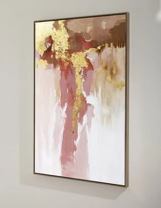 a painting hanging on the wall in a room