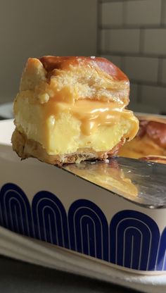 a half eaten pastry sitting on top of a plate