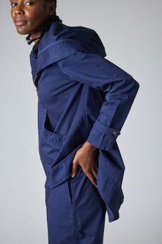 This swing jacket is the perfect outerwear piece for cool spring/summer nights or rainy days. Pair with the matching Twill Wide-ish Pants for a chic but casual look. Hooded Tapered Hemline Zips Up Loose Boxy Fit 2 Front Pockets FINAL SALE Casual Long Sleeve Raincoat For Work, Casual Long-sleeve Workwear Raincoat, Casual Long Sleeve Workwear Raincoat, Casual Workwear Raincoat, Cotton Raincoat With Pockets For Rainy Weather, Blue Relaxed Fit Outerwear With Side Pockets, Casual Fall Raincoat For Workwear, Casual Fall Workwear Raincoat, Spring Blue Outerwear With Button Cuffs