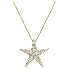 This star pendant shines bright with 96 round VS2, G color diamonds that total 0.87 carats. They are set in 2.5 grams of 18 karat yellow gold. This stunning 5 points star comes with an 18 karat yellow gold chain that can be worn at 3 different lengths to make 16, 17 or 18 inches long. Gold Star Pendant, Yellow Gold Chain, Gold Star, Star Pendant, Gold Stars, Shine Bright, Gold Chain, Colored Diamonds, Jewelry Necklace Pendant