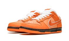 The Concepts x Nike SB Dunk Low “Orange Lobster” is a limited edition collaboration between the Boston based sneaker boutique and Nike SB on the skate shoe that continues its popular “Lobster” series.  Introduced by Concepts and Nike SB in 2008, the “Lobster” collection is a nod to Concepts’ Boston area roots and its cuisine.  The series has featured several iconic SB Dunks, including the “Red Lobster,” “Blue Lobster,” “Green Lobster,” “Yellow Lobster,” “Purple Lobster,” and now the “Orange Lobs Nike Lobster, White Lobster Dunks, Lobster Dunks, Orange Low-top Custom Sneakers For Skateboarding, Nike Sb Dunk Lobster, Nike Sb Orange Lobster, Purple Lobster, Nike Sb Dunk, Black Rubber Bands