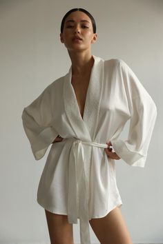 Classic kimono crafted from high quality Italian viscose with lace details. Relaxed silhouette and wide sleeves provide true comfort. Wrap yourself in true luxury.  Our model wears size XS, her measurements are 84/64/89 cm and she is 168 cm tall. Length 88 cm/34,5 inches Wedding Nightgown, Ss 2024, Bridal Kimono, Gown Bridesmaid, Silk Dressing Gown, White Kimono, Silk Kimono Robe, Long Gown Dress, Bridal Robe