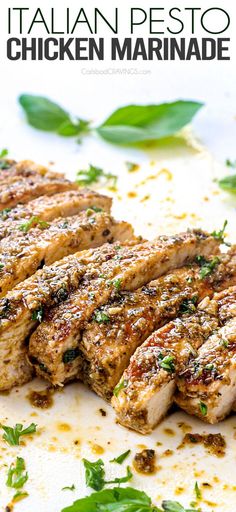 grilled chicken marinade on a cutting board with herbs